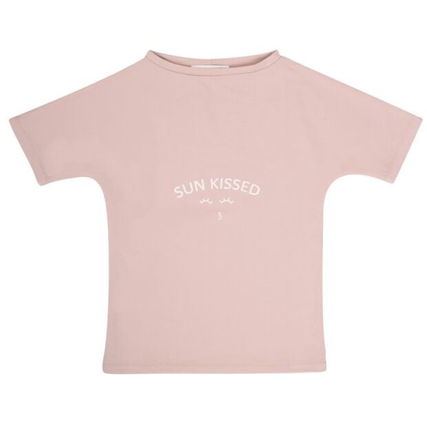 a pink shirt with white text